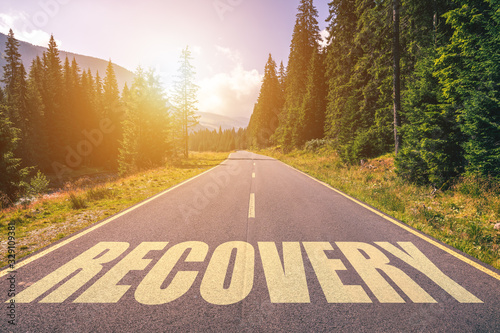 Fotografía Recovery word written on road in the mountains