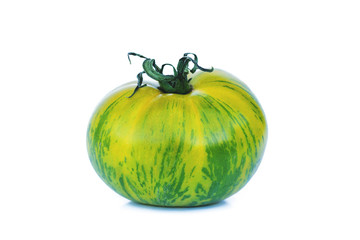 close up of green tomato isolated in white background for text.  