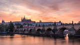 Fototapeta Londyn - Charles Bridge in Prague in Czechia. Prague, Czech Republic. Charles Bridge (Karluv Most) and Old Town Tower. Vltava River and Charles Bridge. Concept of world travel, sightseeing and tourism.