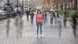© realstock1 - The woman with medical face mask stands on the crowded street