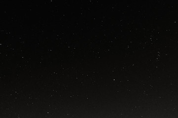 Wall Mural - night sky and star on dark background.with noise and grain.photo by long exposure