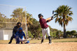 © Wavebreak Media - Baseball player hitting a ball during a match