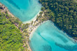 © MAGNIFIER - Aerial view. Top view.amazing nature background.The color of the water and beautifully bright.Azure beach with rocky mountains and clear water of Thailand ocean at sunny day.