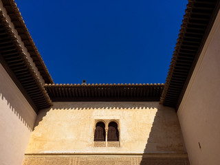 Small Window Overlooking the Cityscape of  Granada, Andalusia / Spain