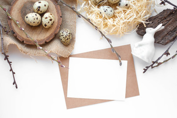 mockup card with plants. invitation card with environment and quail eggs. easter eggs, ribbons and nest on white background