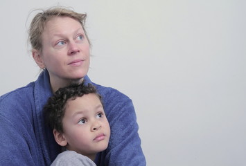 Wall Mural - mother and child looking up with white background stock photo 