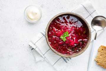 Wall Mural - Traditional Ukrainian Russian vegetable beet soup, borscht on white background, top view