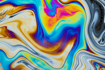 Wall Mural - psychedelic abstract background. photo macro shot with light interference on the surface of a soap b