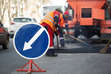 Wall Mural - Warning street sign on road work site.