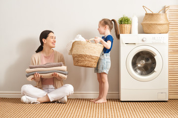 Wall Mural - family doing laundry