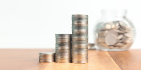 Graph stock market. Pile of Coins on stacks