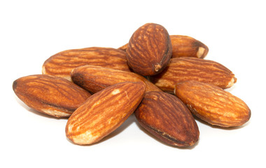 pile of almonds seeds isolated on white background