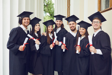 A group of graduates smiling