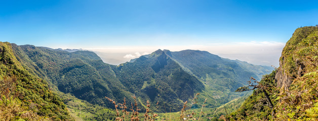 Wall Mural - Panoramic view of the valley from mountain saddle Worlds End in Horton Plains National Park - Sri Lanka