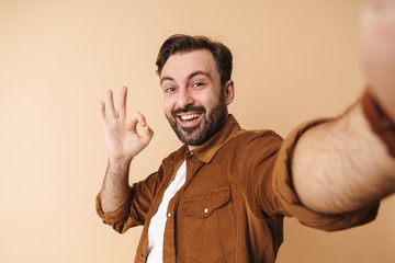 Sticker - Portrait of a cheerful young arttractive bearded man