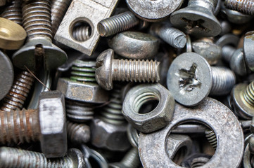 Metal hardware bolts and nails close-up. Macro photography