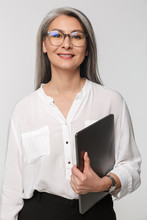 Image Of Adult Mature Woman Wearing Office Clothes Holding Clipboard