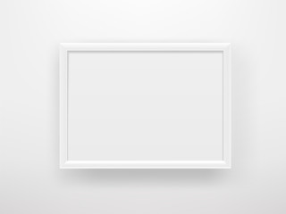 Poster - Empty white frame on a white wall. Horizontal composition