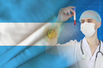 scientist, doctor does a blood test, develops a vaccine, medicine on the background of the silk flag of Argentina, the concept of vaccination against SARS virus, coronavirus, COVID-19, flu, infection