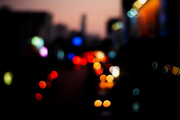 Abstract city blur background with bokeh lights at Night city street lights bokeh background