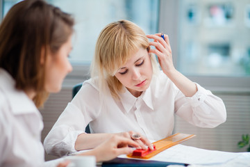 Wall Mural - Two women working in an office