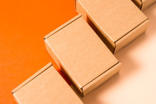 Set Of Brown Cardboard Boxes On Colorful Background