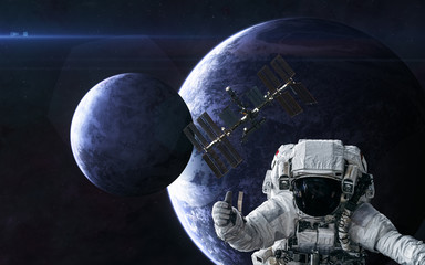 Wall Mural - astronaut, space station on background of planets in deep space. science fiction. elements of this i