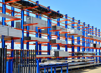 Warehouse Cantilever Racking Systems for storage Aluminum Pipe or profiles. Pallet Rack and Industrial Warehouse Racking. Steel profiles, sheet metal build-profile - Image