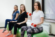 © Andrii - A group of young pregnant mothers are engaged in Pilates and ball sports at a fitness club. Pregnant