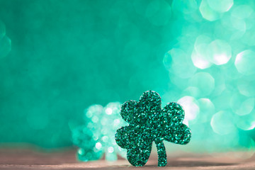 St Patrick's day background with shamrock clover leaf, Irish festival symbol, selective focus