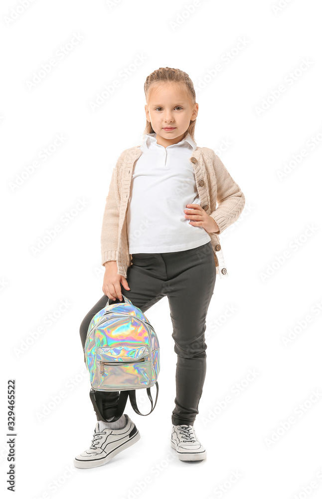 Cute little girl with backpack on white background