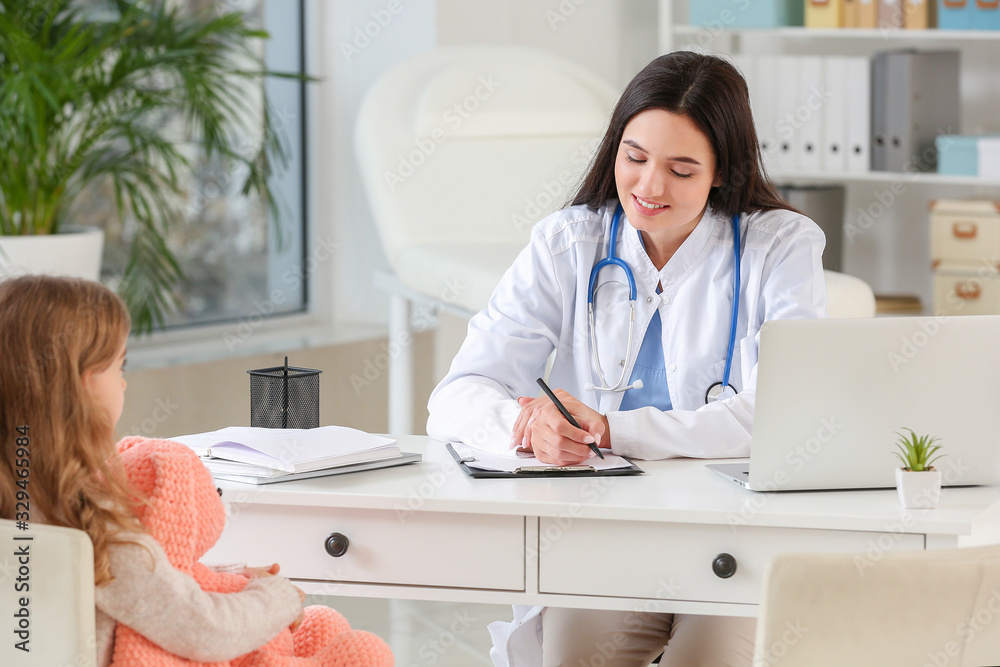 Little girl visiting pediatrician in clinic