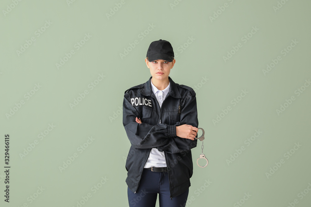 Female police officer on color background
