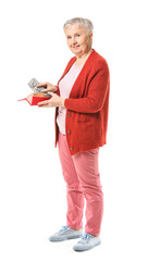 Poster - Senior woman with wallet and money on white background