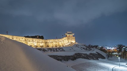 Wall Mural - Night time lapse of Hwaseong fortress in winter, Suwon South Korea.