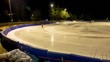 Time Lapse of outdoor ice rink in Norway. Skaters pass by in high speed.