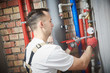 © Kadmy - plumber installing water equipment - meter, filter and pressure reducer