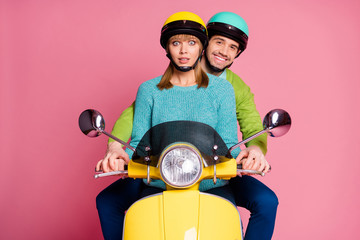 I'm scared. Photo of nice lady guy two people couple trying drive vintage yellow moped eyes full fear afraid to fall down wear casual outfit headgear isolated pink color background