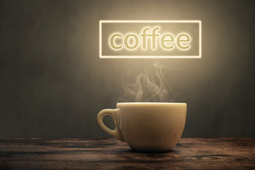 Steaming coffee cup under a glowing coffee sign