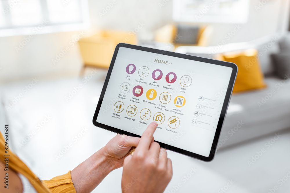 Controlling smart home devices using a digital tablet with launched ...
