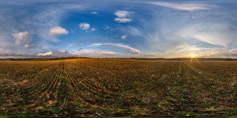 Wall Mural - full seamless spherical hdri panorama 360 degrees angle view among fields in evening sunset with awesome blue pink red clouds in equirectangular projection, ready for VR AR virtual reality