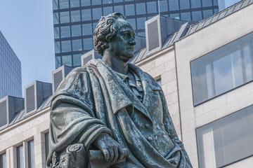 Wall Mural - Bronze statue of poet Johann Wolfgang von Goethe at the Goetheplatz in Frankfurt am Main, Germany. Monument created in 1844.