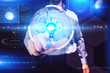 © photon_photo - Business, Technology, Internet and network concept. Young businessman working on a virtual screen of the future and sees the inscription: