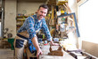 © leszekglasner - Smiling and proud mature carpenter in his carpentry workshop
