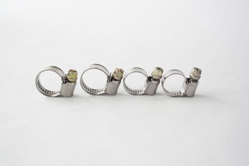 Stainless steel worm clamp on a white background