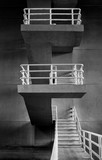 Fototapeta Na drzwi - Concrete stairway with iron railing under bridge