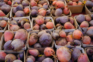 Wall Mural - Containers of colorful beets at a farmers market