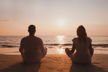Yoga And Meditation In Goa, Silhouette Of Man And Woman At Sunset, India