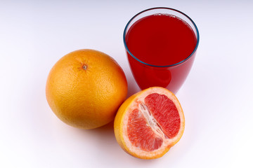 Poster - Grapefruit fruit and juice on a white background