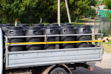 Transportation Of Chemical Agents In Plastic Barrels On Truck.